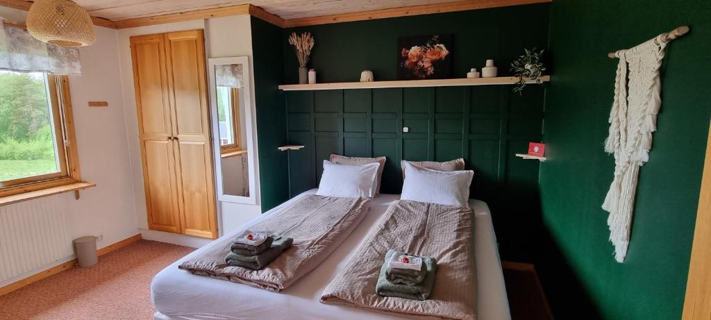 Postel nebo postele na pokoji v ubytování Wild Power Guesthouse