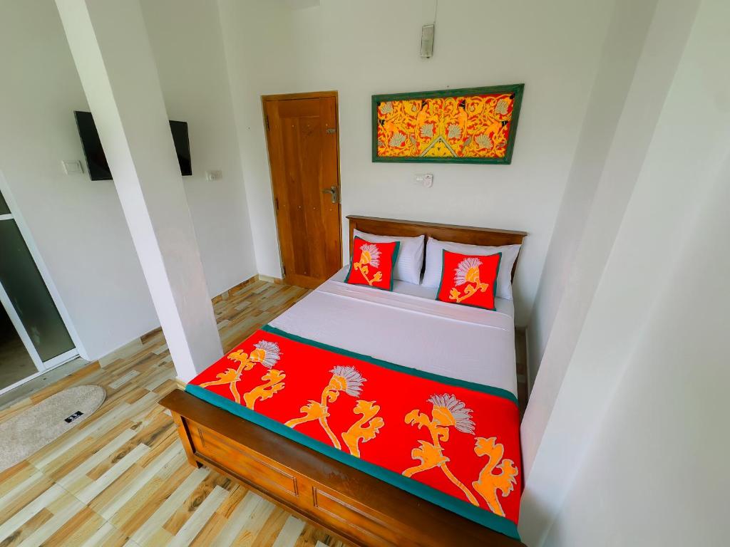 Postel nebo postele na pokoji v ubytování The Kandy Home & City mirror Hostel