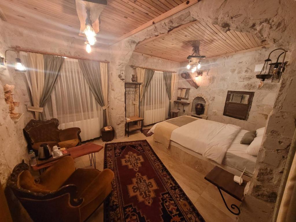 Postel nebo postele na pokoji v ubytování LA DiAS CAVE CAPPADOCİA