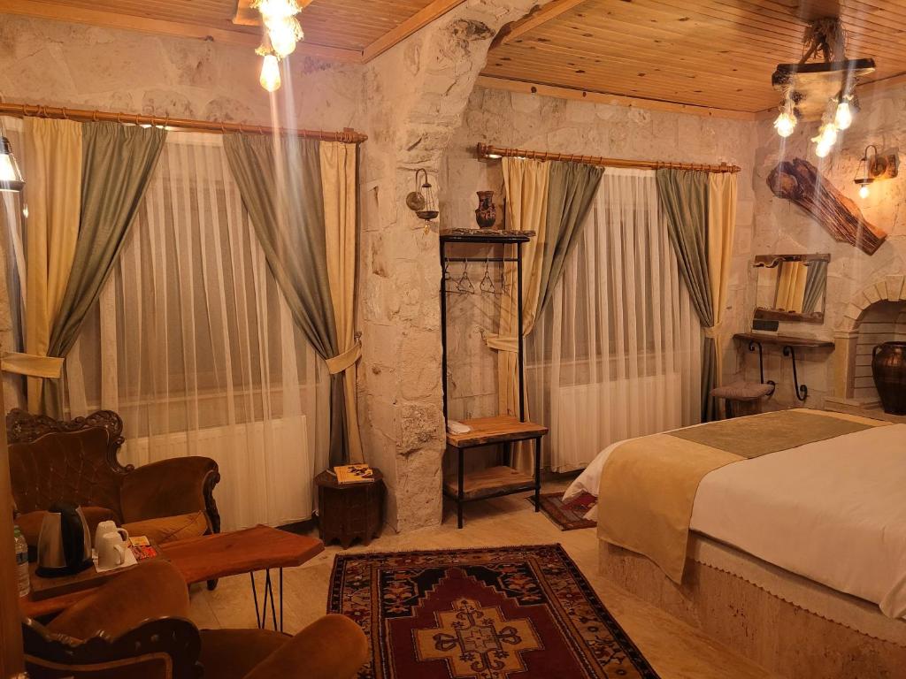 Postel nebo postele na pokoji v ubytování LA DiAS CAVE CAPPADOCİA