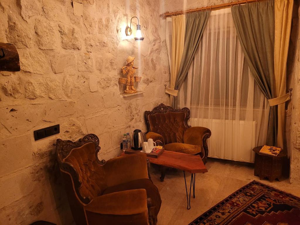 Posezení v ubytování LA DiAS CAVE CAPPADOCİA