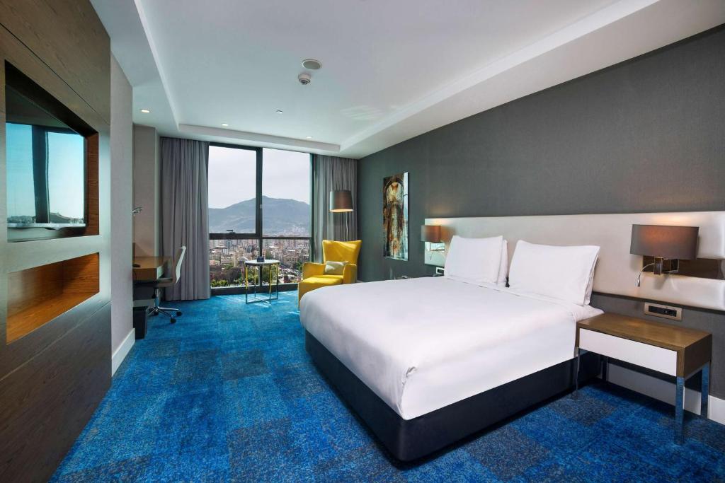 Postel nebo postele na pokoji v ubytování Radisson Blu Hotel, Kayseri