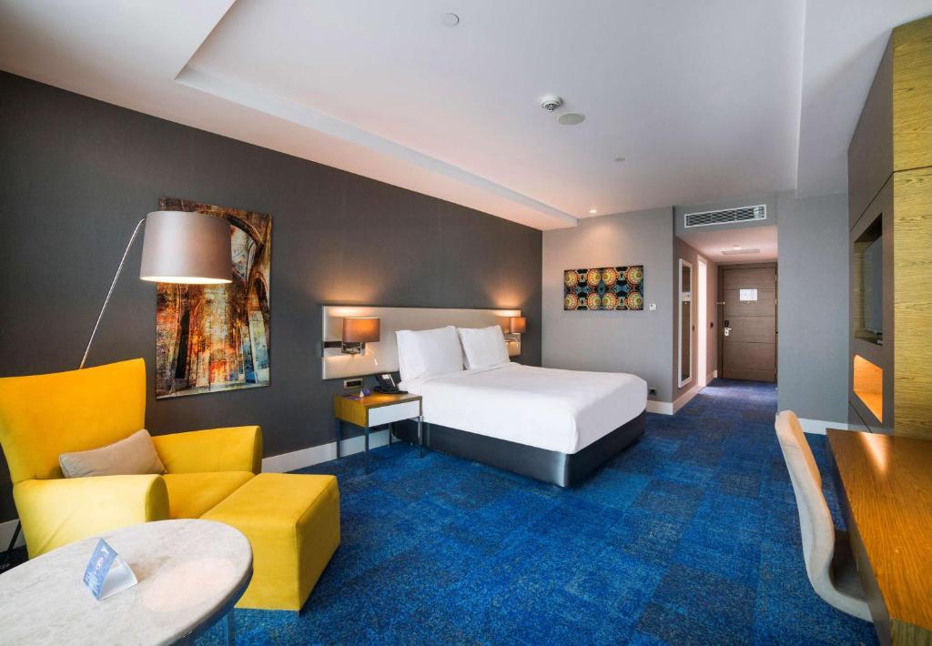 Postel nebo postele na pokoji v ubytování Radisson Blu Hotel, Kayseri