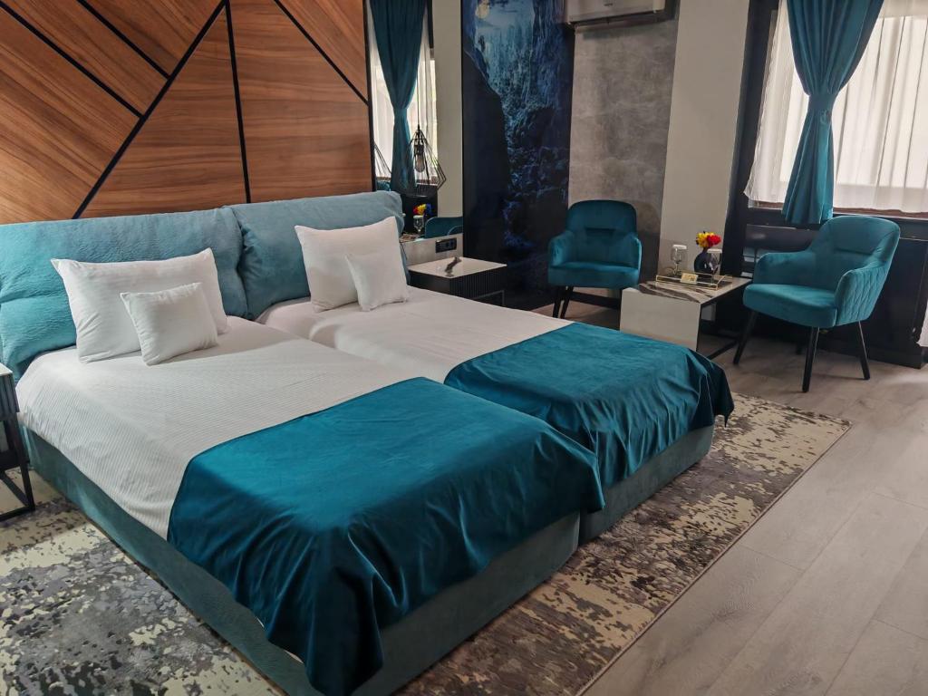 Postel nebo postele na pokoji v ubytování Complex Turistic Casa Romaneasca