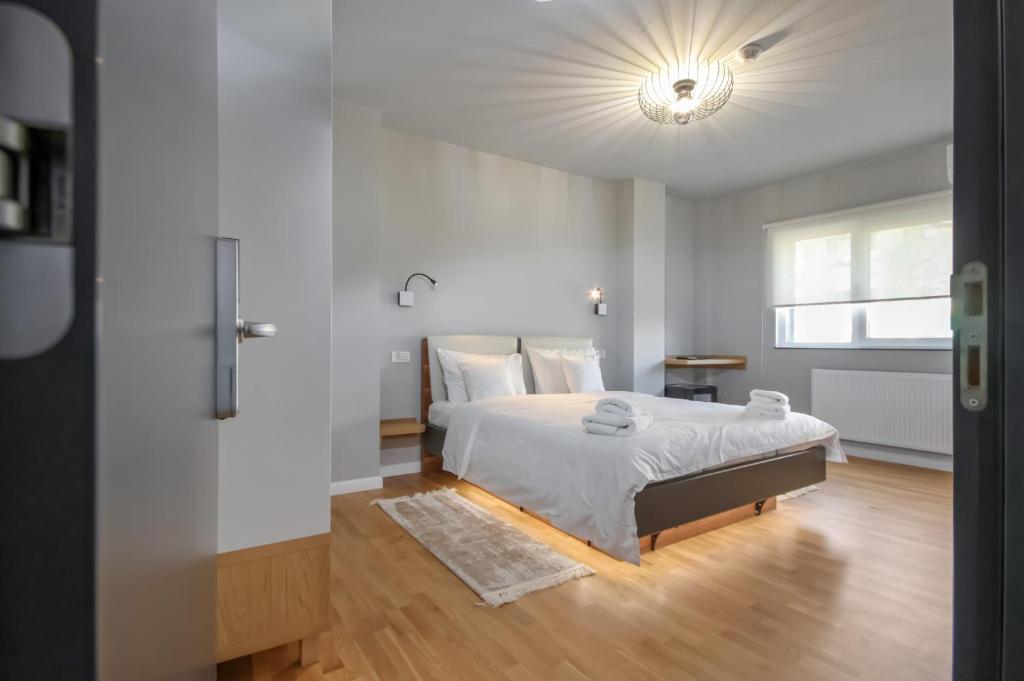 Ένα ή περισσότερα κρεβάτια σε δωμάτιο στο Pit4U Accommodation