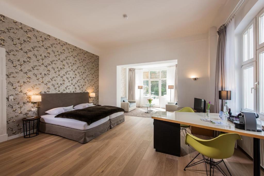 Postel nebo postele na pokoji v ubytování Boutique-Hotel Villa Anna