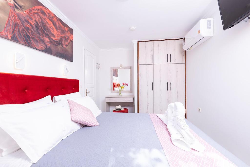 Postel nebo postele na pokoji v ubytování AD HOMES
