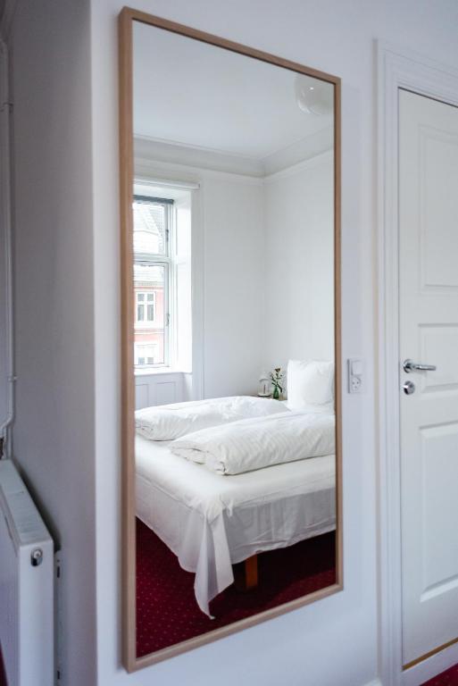 Postel nebo postele na pokoji v ubytování Hotel Nora Copenhagen