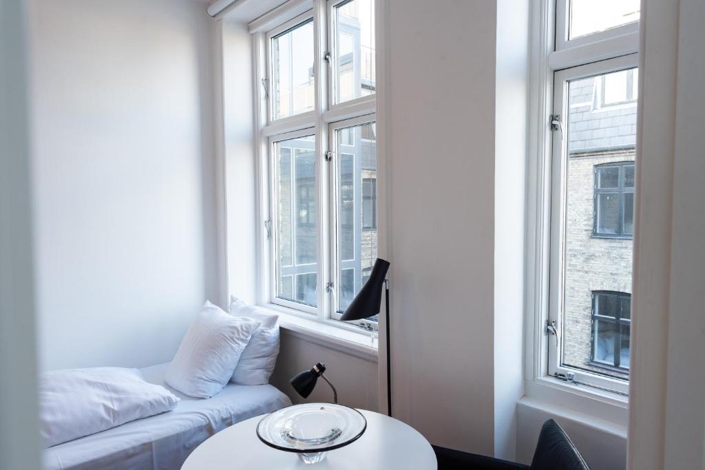 Postel nebo postele na pokoji v ubytování Hotel Nora Copenhagen