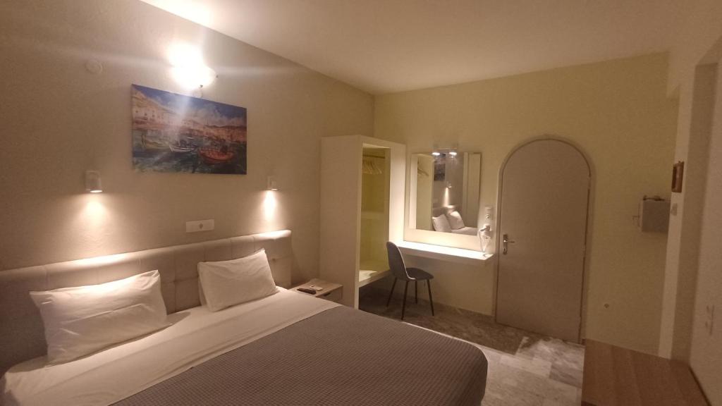 Postel nebo postele na pokoji v ubytování Villa Kavourakia