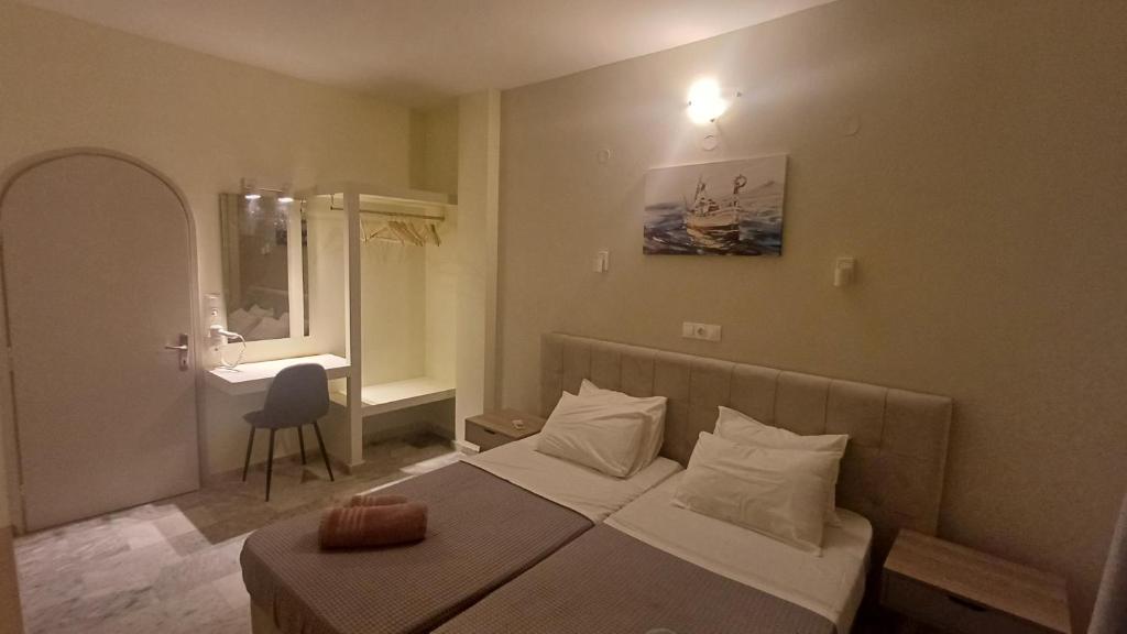 Postel nebo postele na pokoji v ubytování Villa Kavourakia