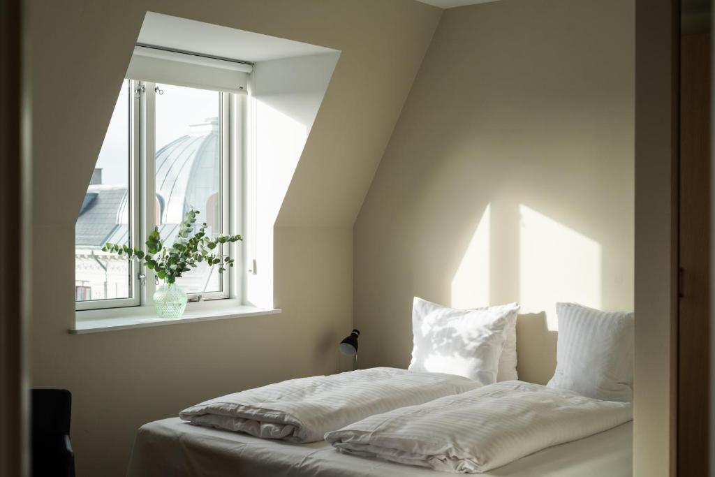 Postel nebo postele na pokoji v ubytování Hotel Nora Copenhagen