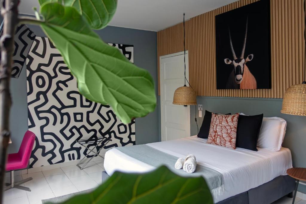 Postel nebo postele na pokoji v ubytování Nomadia Coliving Boutique