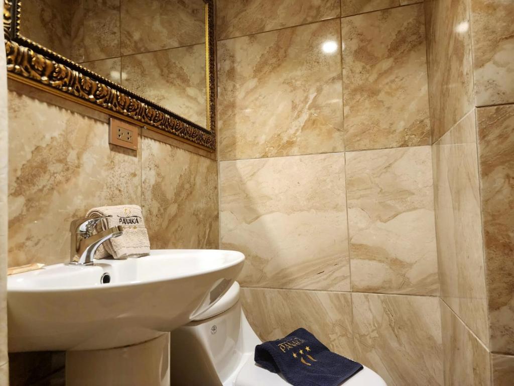 Koupelna v ubytování Hotel Panaka II