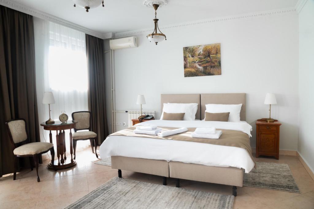 Postel nebo postele na pokoji v ubytování Hotel Jardin