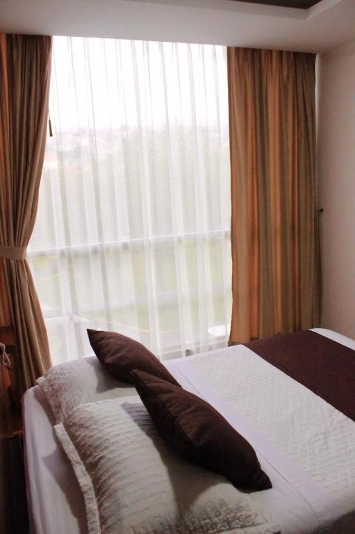 Postel nebo postele na pokoji v ubytování HOSTAL CAMIL