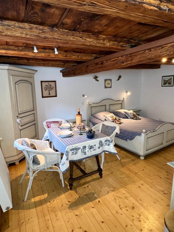 Postel nebo postele na pokoji v ubytování Gîte de la Rivière Enchantée