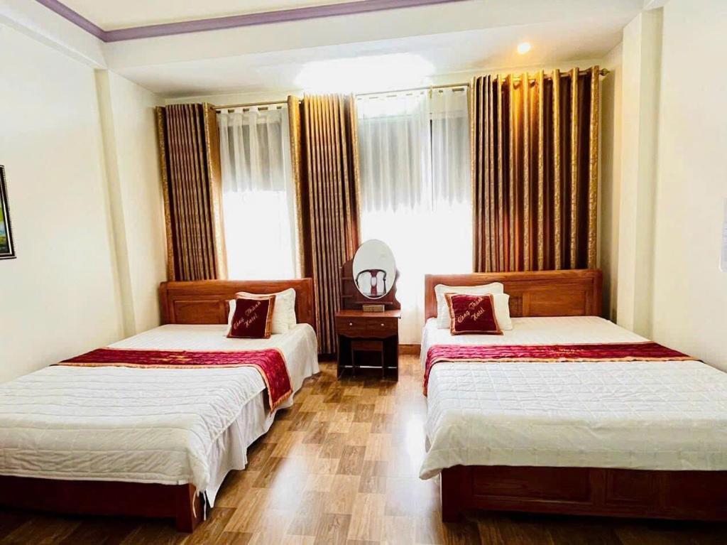 Postel nebo postele na pokoji v ubytování Công Thành Hotel 1
