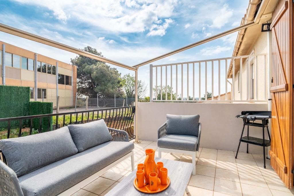 En balkon eller terrasse på Maison Chataîgniers