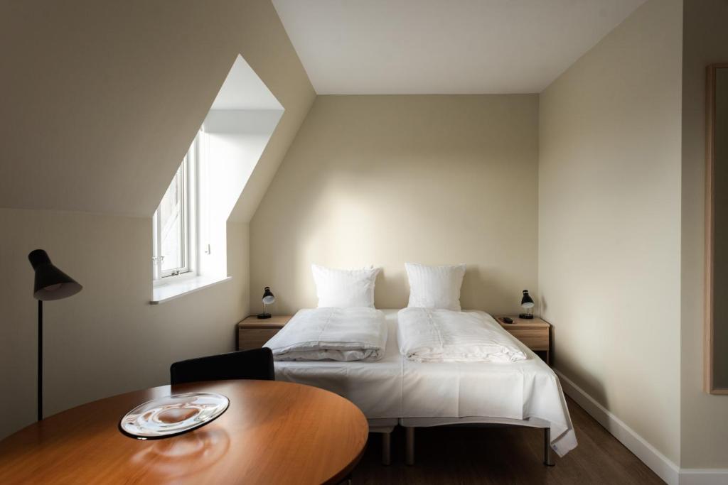 Postel nebo postele na pokoji v ubytování Hotel Nora Copenhagen