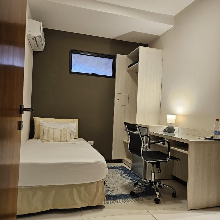 Postelja oz. postelje v sobi nastanitve Casa Garay Hotel 658