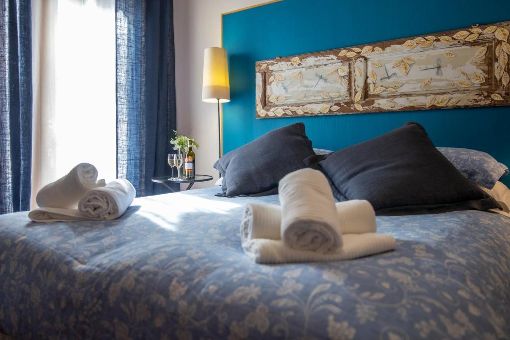 Posteľ alebo postele v izbe v ubytovaní DeiMori LaMassa private villa with pool