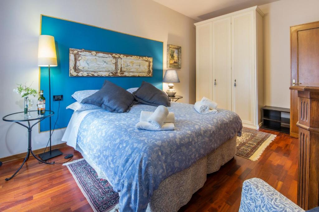 Posteľ alebo postele v izbe v ubytovaní DeiMori LaMassa private villa with pool