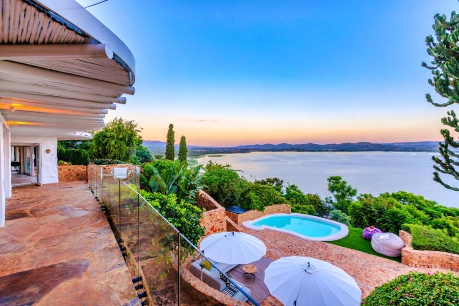 a villa with a view of the water at Enso Botanico Boutique Villa, Kosmos in Hartbeespoort
