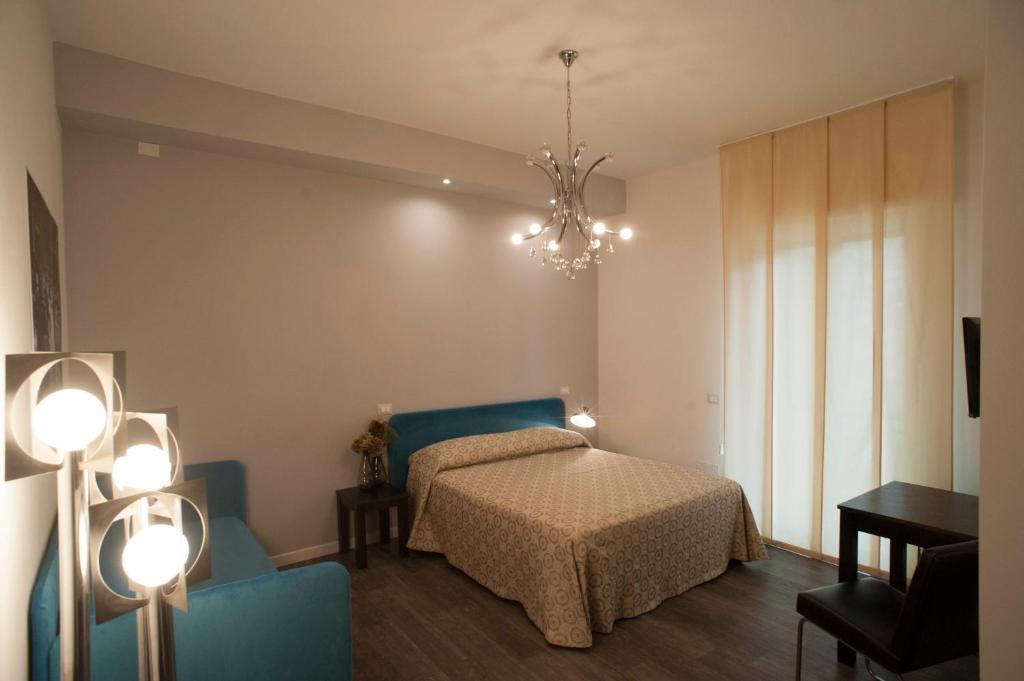 Кровать или кровати в номере B&B Corso Diaz