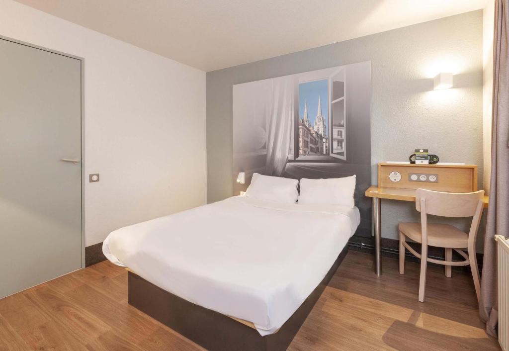 Postel nebo postele na pokoji v ubytování B&B HOTEL Bayonne
