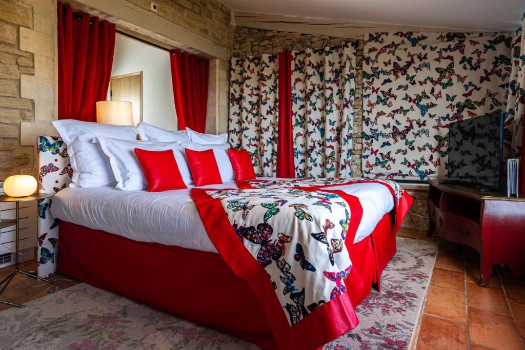 Le Palais d'Aglaé, Hôtel de Charme客房内的一张或多张床位