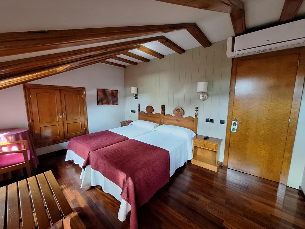 Postel nebo postele na pokoji v ubytování Hotel Aragüells