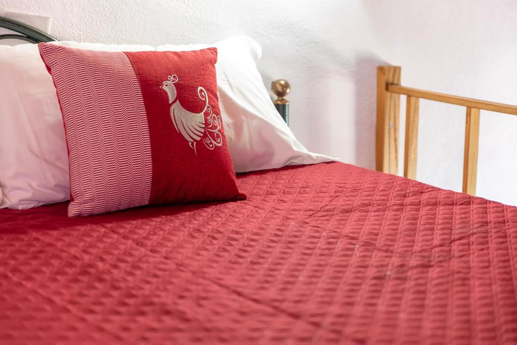 Postel nebo postele na pokoji v ubytování Alguer Guest House