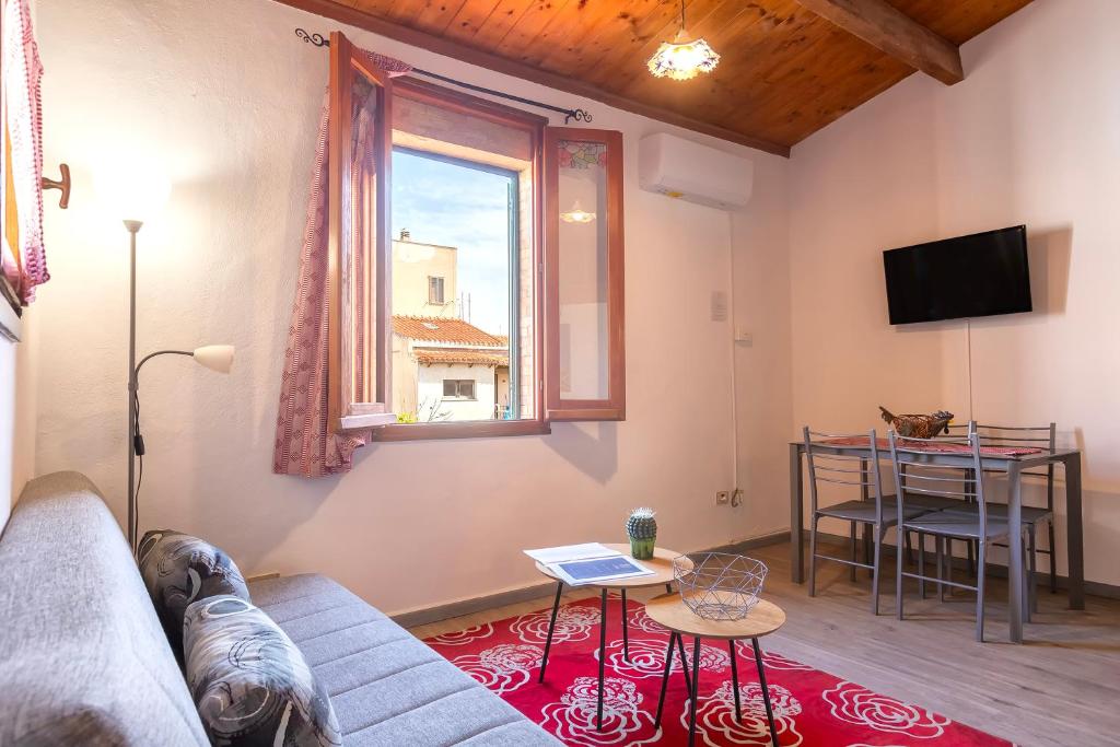 TV a/nebo společenská místnost v ubytování Alguer Guest House