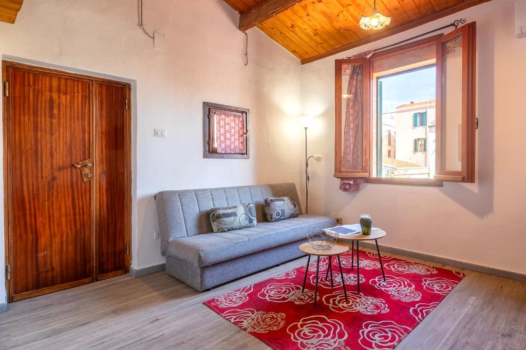 Posezení v ubytování Alguer Guest House