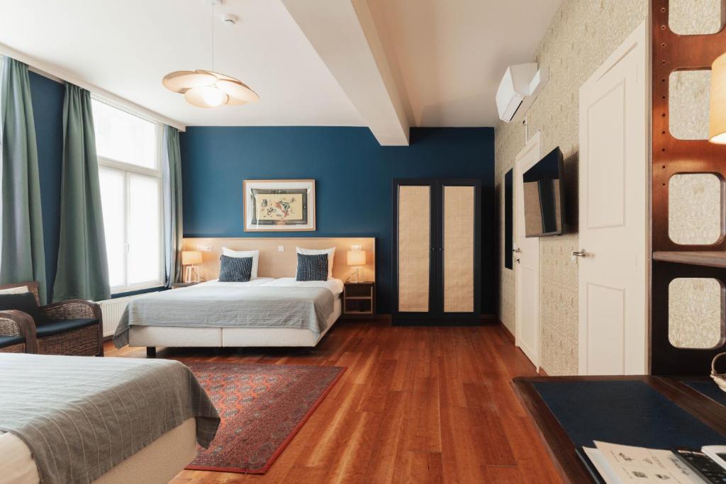 Postel nebo postele na pokoji v ubytování Boutique Hotel Malleberg
