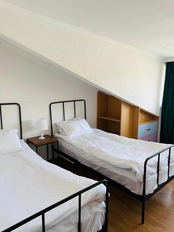 Postel nebo postele na pokoji v ubytování Bonito