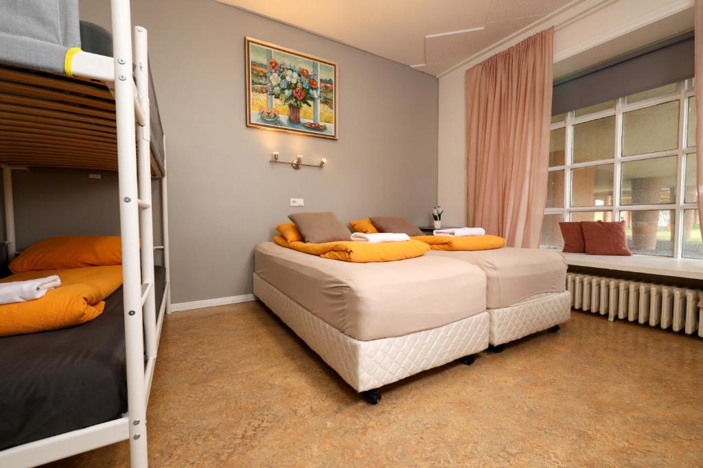 Postel nebo postele na pokoji v ubytování Hostel B47