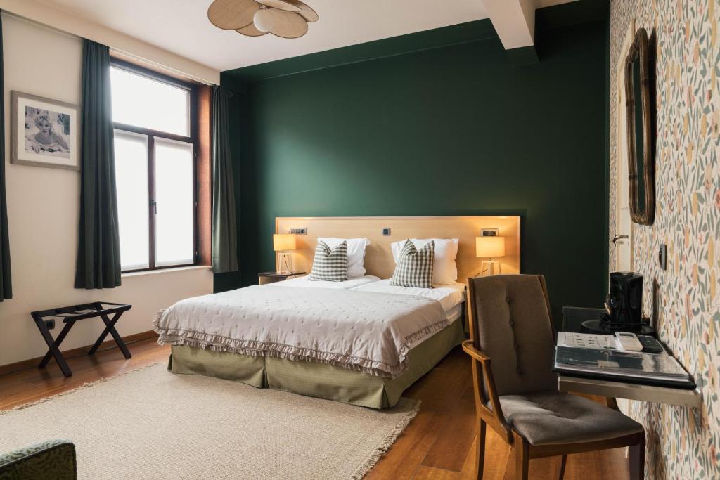 Postel nebo postele na pokoji v ubytování Boutique Hotel Malleberg