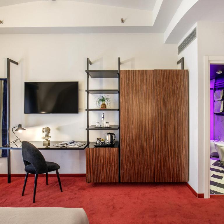 TV a/nebo společenská místnost v ubytování Hotel Monte Cenci