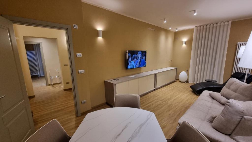 TV a/nebo společenská místnost v ubytování Albergo Trieste Boves - Ricetto Suite