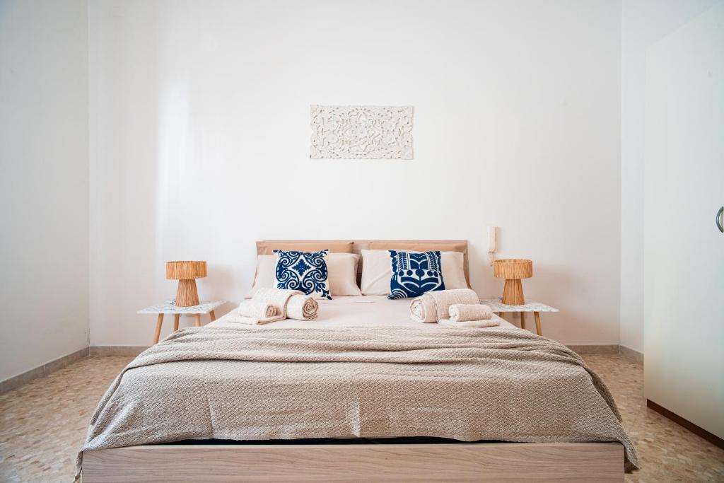 Giường trong phòng chung tại Otranto Dream