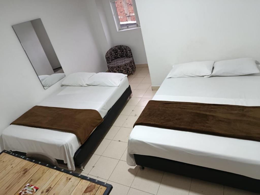 Postel nebo postele na pokoji v ubytování Hotel Bayadera Real