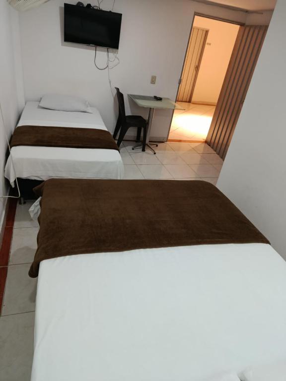 Postel nebo postele na pokoji v ubytování Hotel Bayadera Real