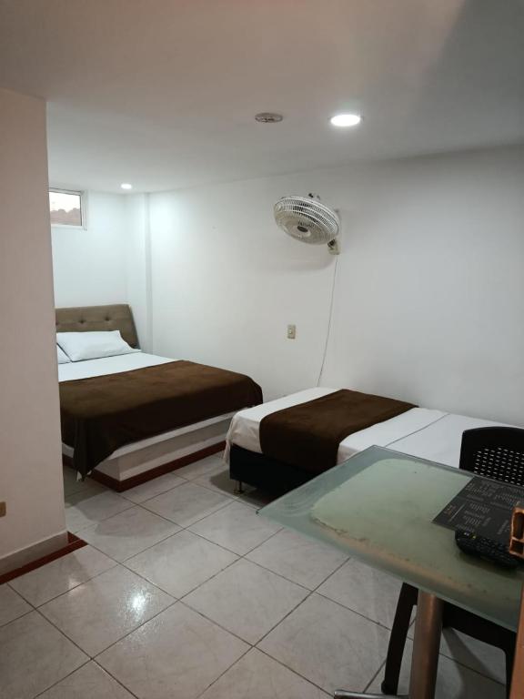 Postel nebo postele na pokoji v ubytování Hotel Bayadera Real