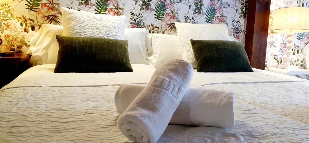 A bed or beds in a room at El Juacu