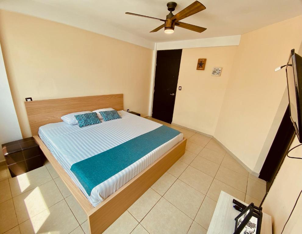 Postel nebo postele na pokoji v ubytování FRENTE PLAYA vista al mar, PISCINA DE USO EXCLUSIVO