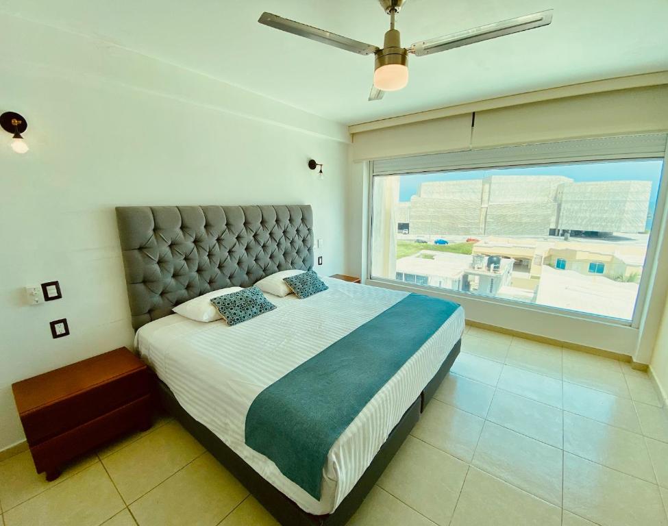 Postel nebo postele na pokoji v ubytování FRENTE PLAYA vista al mar, PISCINA DE USO EXCLUSIVO