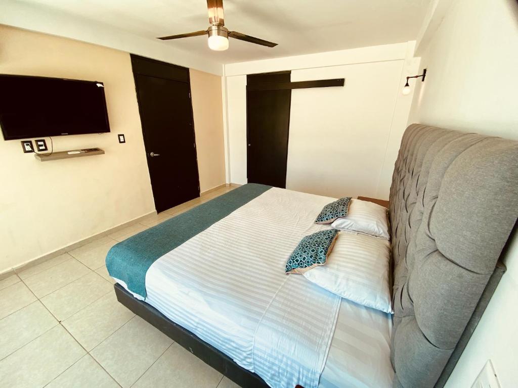 Postel nebo postele na pokoji v ubytování FRENTE PLAYA vista al mar, PISCINA DE USO EXCLUSIVO