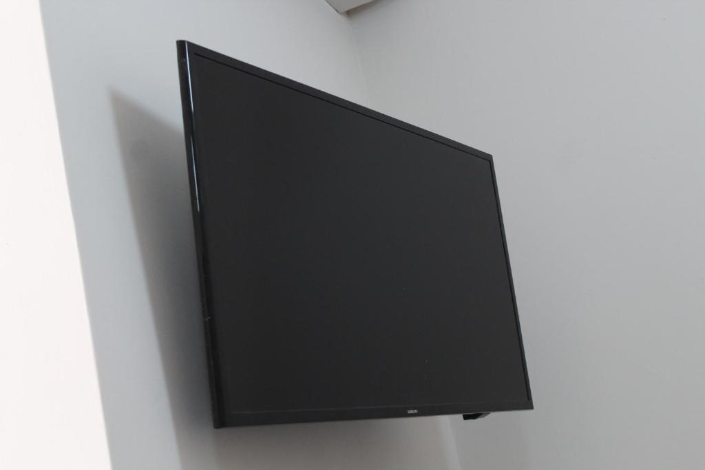 TV a/nebo společenská místnost v ubytování Lofts Sayula Independencia